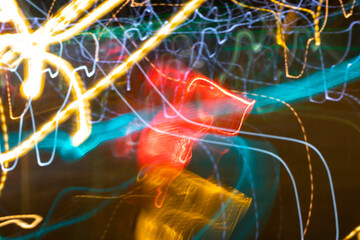 City night lights perspective blurred, drugs like perceptions. Vivid, tangled streaks of light....