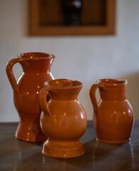 The old clay jugs on table