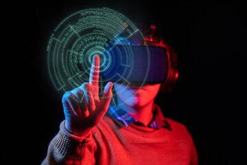 Young man pressing virtual button with VR headset and colorful lights