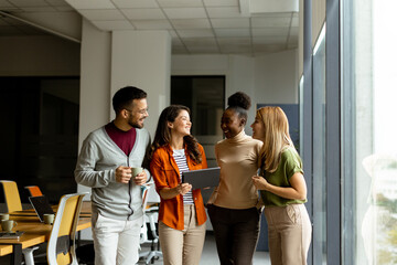 Young multiethnic startup team working in the modern office