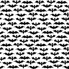Fototapeta premium Halloween Bat Seamless Pattern. Vector Repeat Background with Black Bat Silhouettes. Mystical Horror Pattern Design. Hand Drawn Halloween Motif for Fabric, Surface Design.