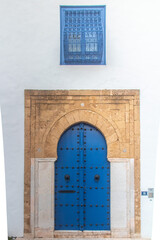 Blue door of traditional architecture of the coastal village of Sidi Bou Said in Tunisia in Africa