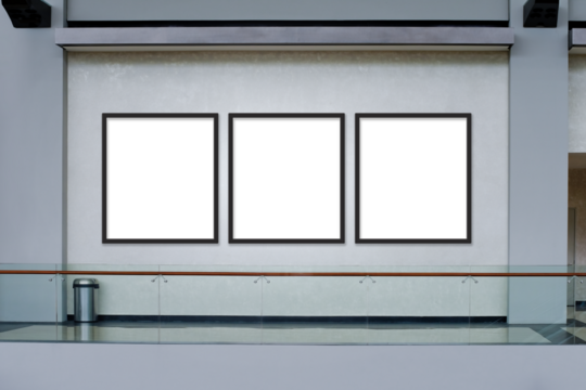 3 vertical advertising blank mockups on light textured wall. OOH out of home framed posters template. Modern shopping mall interior. Transparent PNG file