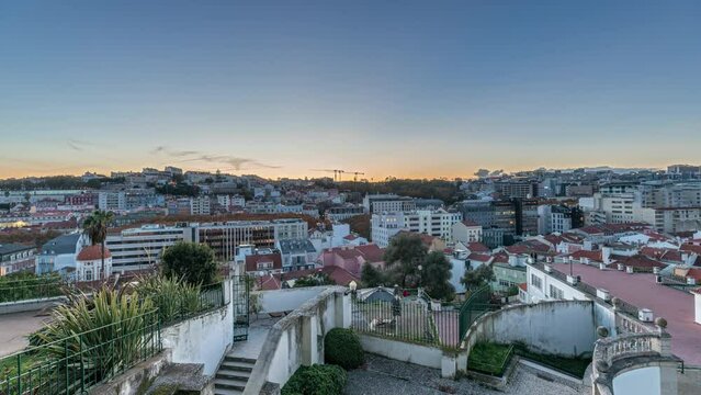 Panorama showing Jardim do Torel day to night transition timelapse, a traditional garden and viewpoint with unusual views to the city center of Lisbon. It has a terrace and a large pond. Portugal