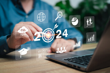2024 planning business growth concept, Businessman plan strategy marketing and finance environmental conservation use technology to  management business to grow sustainably digital transformation - obrazy, fototapety, plakaty