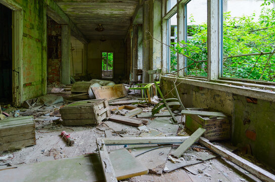 Corridor of abandoned school in resettled village of Pogonnoye in exclusion zone of Chernobyl nuclear power plant, Belarus
