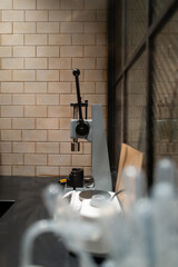 Laboratory equipment against the tiled wall