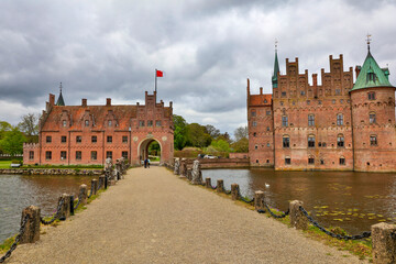 Denmark Egeskov Castle view on a cloudy spring day