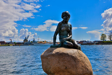 Denmark Copenhagen sculpture of the Little Mermaid on a sunny spring day - obrazy, fototapety, plakaty