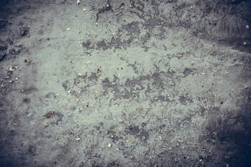 Texture of a dirty and shabby gray wall