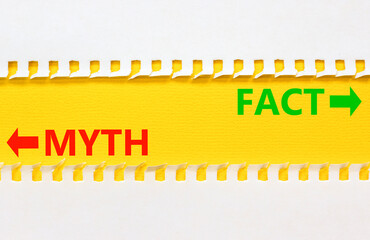 Fact or myth symbol. Concept word Myth and Fact on beautiful yellow paper. Beautiful white paper...