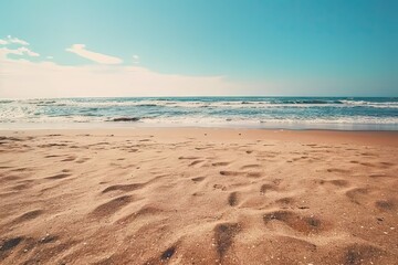 Breathtaking view of beach azure sea meets golden shore creating picturesque scene of tranquility and natural beauty. Gentle waves kiss sandy coastline under warm glow of sun