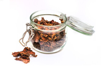 dried chopped root of Rhoda rosea in a glass jar, used in rejuvenating the human body