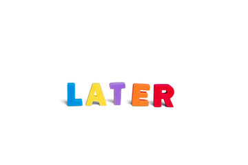 word Later consists of colorful three-dimensional sponge letters on a white background