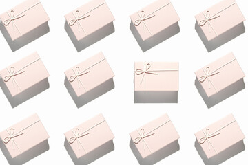 Lots of soft pink gift wrappings on a white background. Top view, flat lay