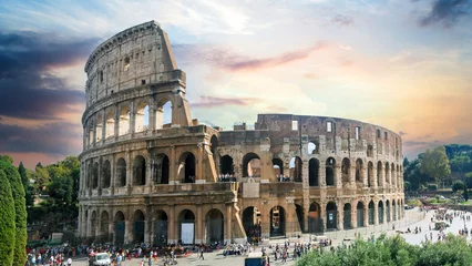 Poster Rome, Italy view towards the Colosseum with archeological areas at sunset.  © khan