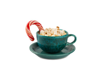 Hot drink with marshmallows and candy cane in a blue cup isolated on a white background.Cozy seasonal holidays.Hot cocoa with gingerbread Christmas cookies.Hot chocolate with marshmallow and spices.