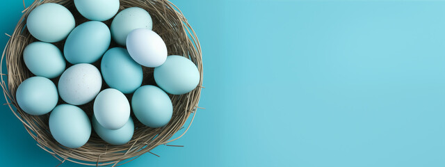 a basket of easter eggs on top of a blue background
