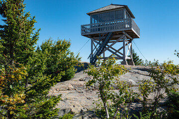 Fire tower in NH White Mountain National Forest built on a ledge reenforced with steel cables....