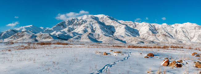 Winter mountains panoramic landscape at sunny day