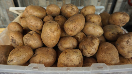 pile of potatoes placed in a container