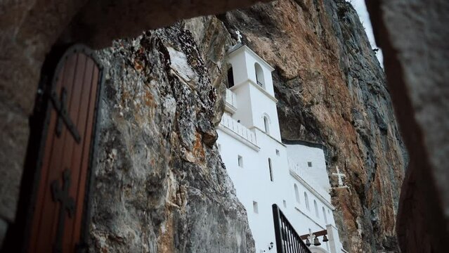 Ostrog Monastery in Montenegro. This pilgrimage place is managed by Serbian Orthodox Church and is situated high up in a vertical rock