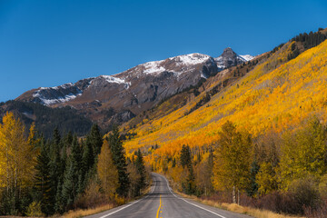 Scenic Road America Colorado Million Dollar Highway Vista Mountain Road in Autumn Yellow Aspen...
