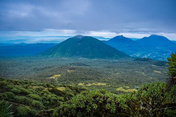 Bisoke, Sabyinyo, Gahinga, and Muhabura volcanoes viewed from Karisimbi volcano, Rwanda