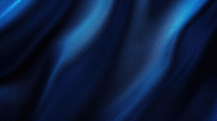 Obraz premium Silk satin fabric. Navy blue color. Abstract dark elegant background with space for design. Soft wavy folds. Drapery. Gradient. Light lines. Shiny. Shimmer. Glow.Template.