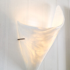 Vintage glass shade wall sconce lamp. Minimalist lighting design. 