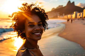 young brazilian afro hairstyle woman walking on the beach	 - obrazy, fototapety, plakaty