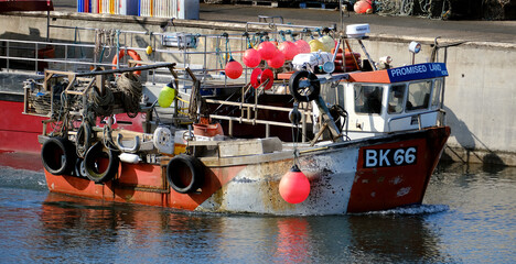 Crab and lobster fishing vessel near the Farne islands. Northumberland, UK.