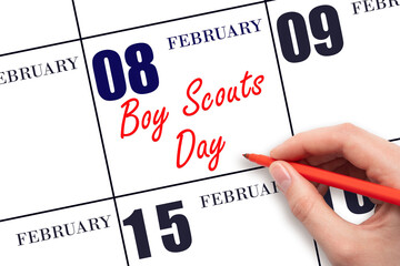 February 8. Hand writing text Boy Scouts Day on calendar date. Save the date.