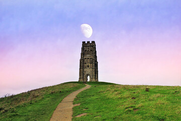Glastonbury Tor near Glastonbury in the English county of Somerset, topped by the roofless St...
