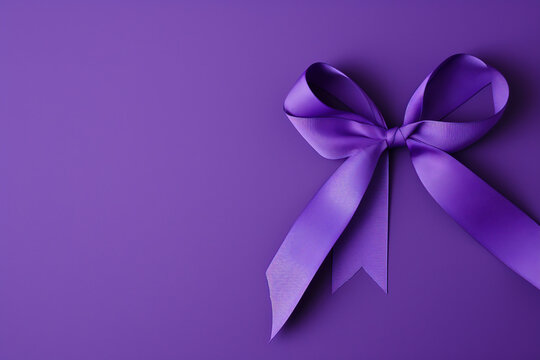 purple ribbon  symbolizes support and awareness for many types of cancer, including pancreatic cancer, testicular cancer, and others.