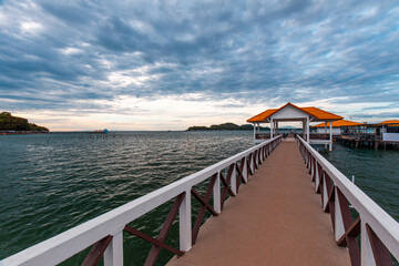 Fototapeta premium small wooden bridge For walking to the seaside pavilion