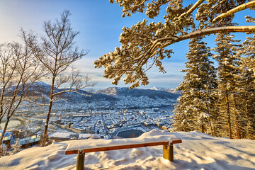 Bench with great panoramic view over Bergen in winter, Norway