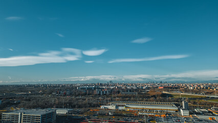 View fashion capital Milan against a blue sky from a drone in December. Drone view of Milan from...