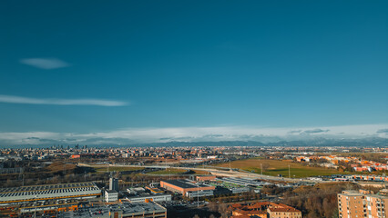 View fashion capital Milan against a blue sky from a drone in December. Drone view of Milan from...