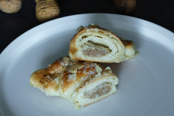 Fresh traditional polish pastry with white poppy-seed filling and nuts. St. Martin's croissant,...