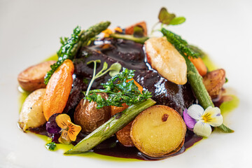 baked vegetables in the white plate