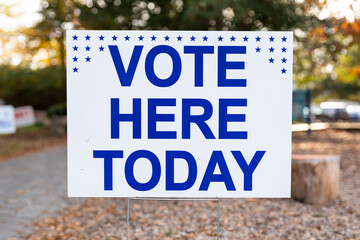 Election Day Voting Sign with the Text 'VOTE HERE TODAY' Surrounded by Stars