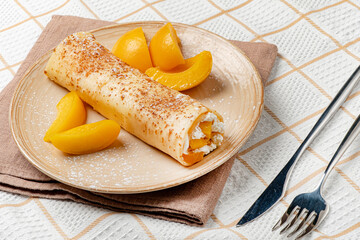 pancake with whipped cream and peach