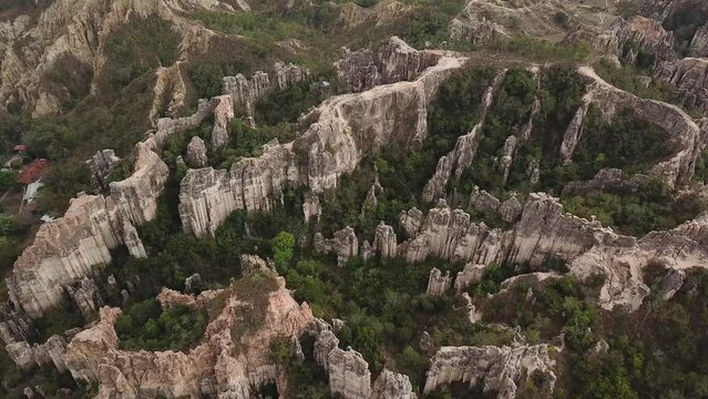Aerial drone footage of Los Estoraques Unique Natural Area, Colombia, Latin America. Beautiful colombian sharp rocks. Beautiful landscape in the Norte de Santander region of Colombia. 4K footage.
