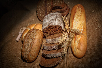 Fresh loaves of bread, various breads for toasts and sandwiches, delicious crispy breads,...
