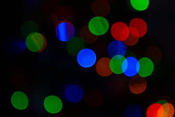 Multicolor bokeh, raining light, blurry lights, blurry background, rainbow confettis on a black background, colorful, night lights, city lights, haze, depth of field, round bokeh, circle bokeh - obrazy, fototapety, plakaty