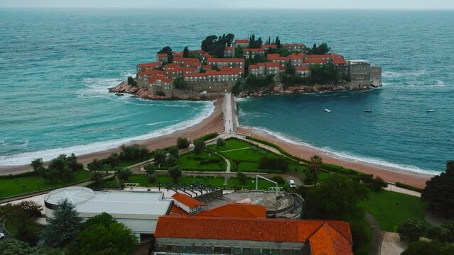 Sveti Stefan. Montenegro. Fantastic aerial view of the beach and Sveti Stefan island. Beautiful architecture and the blue Adriatic Sea.
