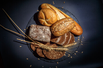 Fresh loaves of bread, various breads for toasts and sandwiches, delicious crispy breads,...