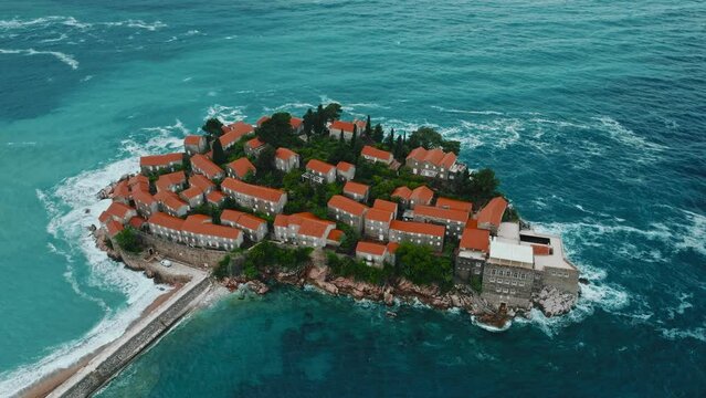 Sveti Stefan. Montenegro. Fantastic aerial view of the beach and Sveti Stefan island. Beautiful architecture and the blue Adriatic Sea.