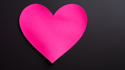 Hot Pink Paper Heart on a black Background. Romantic Template with Copy Space